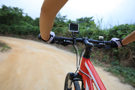 cyclist cycling mountain bike on trailの写真素材