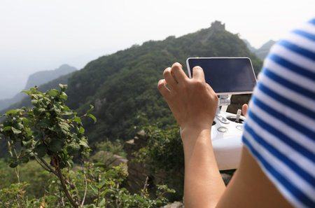 flying drone taking photo of the great wall landscape in China