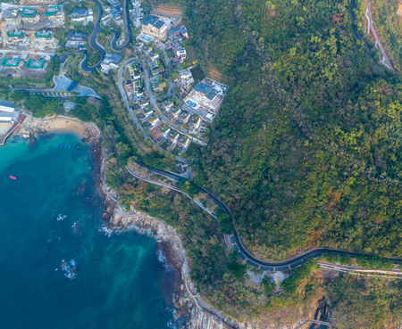 looking down from drone aerial view of the coastlineの写真素材