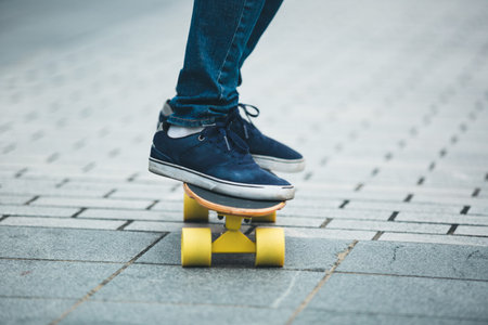 legs skateboarding on ctiy street