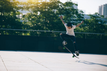 Skateboarder skateboarding at city