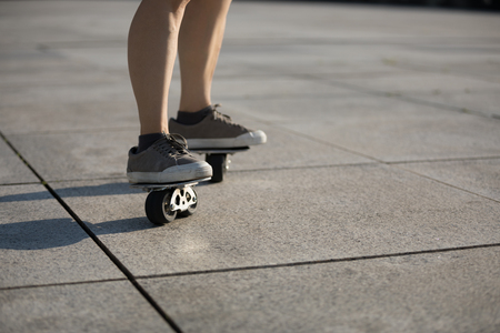 Freeline skateboarder riding on urbanの写真素材