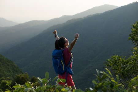 successful hiker  on   mountain topの写真素材