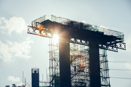 Construction of a highway bridge in the sunriseの写真素材
