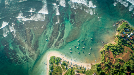 aerial view of tropical coastline and fisherman villageの写真素材