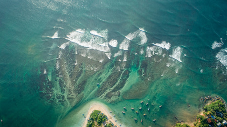 Aerial view of  seascape with fishing boats in the coastの写真素材