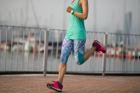 Healthy lifestyle woman runner running on hong kong city
