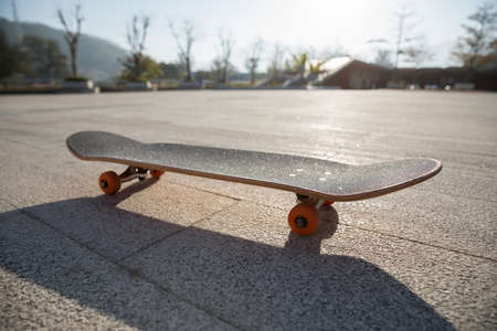 Skateboard outdoors on sunny morningの写真素材