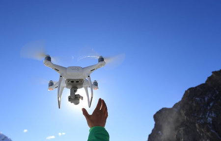 Drone flying in high altitude sky