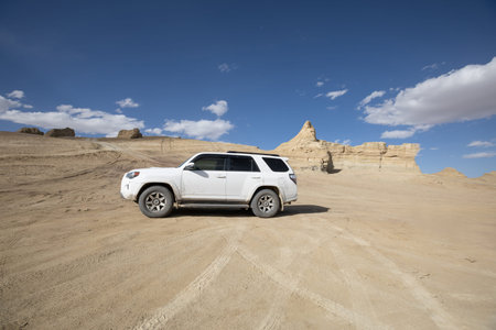 Driving off road car in the desertの写真素材