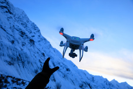 Drone flying in high altitude sky