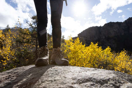Woman hiker hiking  in winter mountainsの写真素材