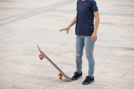 Skateboarder skateboarding outdoors in the morningの写真素材