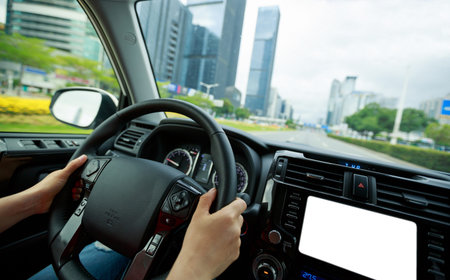 Driving car on city streetの写真素材