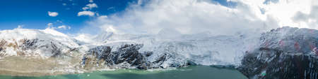 Aerial view of glacier mountains and lagoon in Tibet,Chinaの写真素材