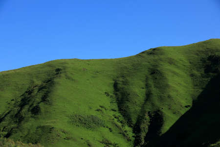 High altitude grassland mountain landscapeの写真素材