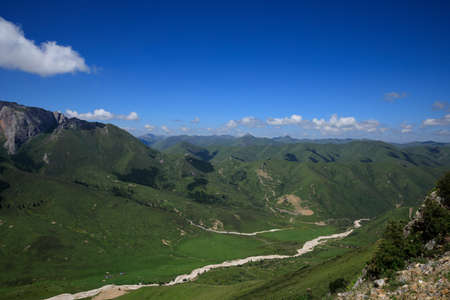 High altitude grassland mountain landscapeの写真素材