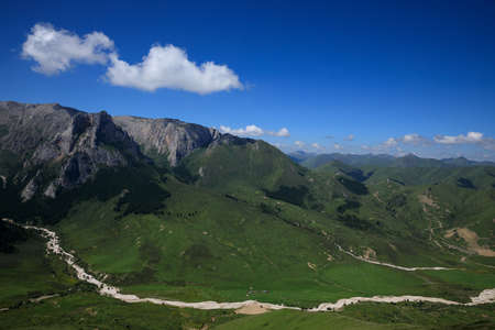 High altitude grassland mountain landscapeの写真素材