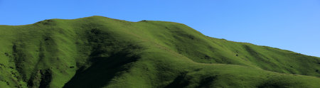 Panorama view of  high altitude grassland mountain landscapeの写真素材