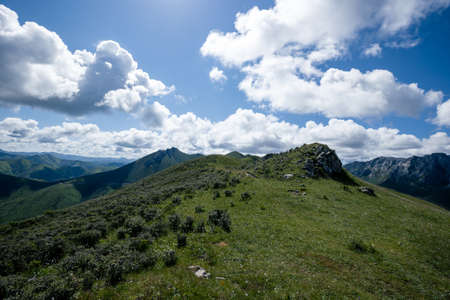 High altitude mountain landscape under blue skyの写真素材