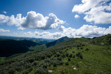 High altitude mountain landscape under blue skyの写真素材