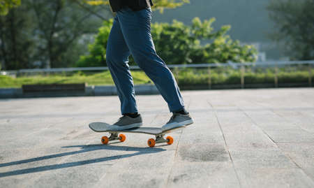 Skateboarder skateboarding outdoors in cityの写真素材
