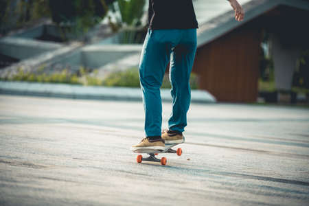 Skateboarder skateboarding outdoors in cityの写真素材