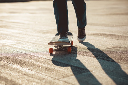 Skateboarder skateboarding outdoors in cityの写真素材