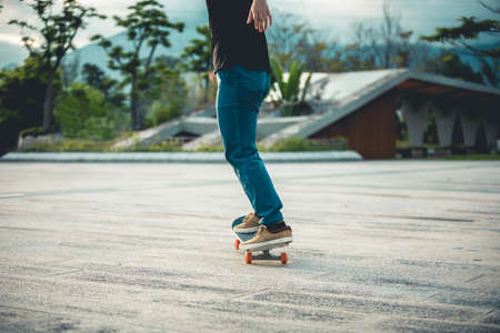 Skateboarder skateboarding outdoors in cityの写真素材