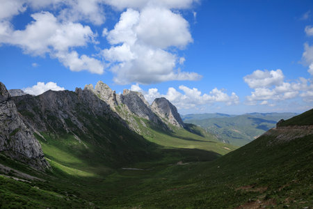 High altitude mountain landscape under blue skyの写真素材