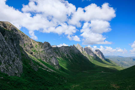 High altitude mountain landscape under blue skyの写真素材