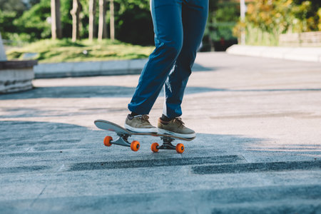 Skateboarder skateboarding outdoors in cityの写真素材