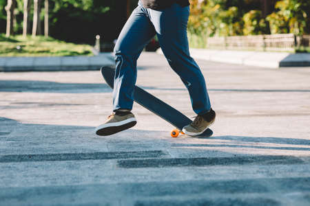 Skateboarder skateboarding outdoors in cityの写真素材