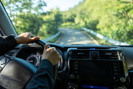 People driving car on morning mountain road