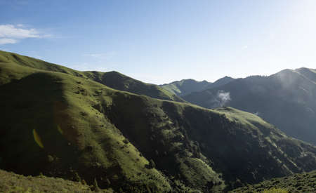 High altitude grassland mountain landscapeの写真素材