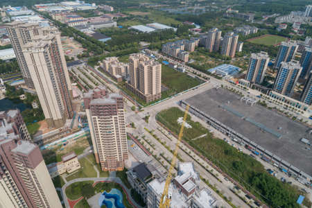 Aerial view of multistory apartment construction site in Chinaの写真素材