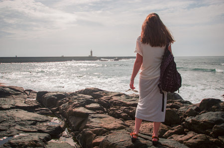 woman on a rocky beach