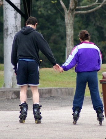 a young couple holding hands                の写真素材