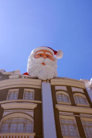Papa noel on top of the roof                   の写真素材
