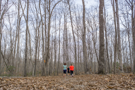 Two Women Walking Down a Trail, Exercisingの写真素材