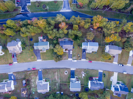 Aerial View of a Cookie Cutter Neighborhood in the Fallの写真素材