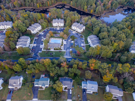 Aerial View of a Cookie Cutter Neighborhood in the Fallの写真素材