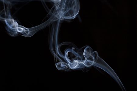 Beautiful white smoke on black.の写真素材