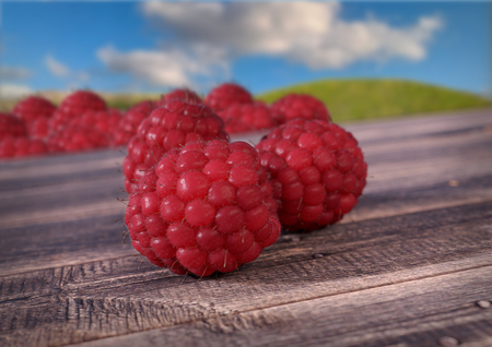 Raspberries on wooden desk. - 3D renderの写真素材