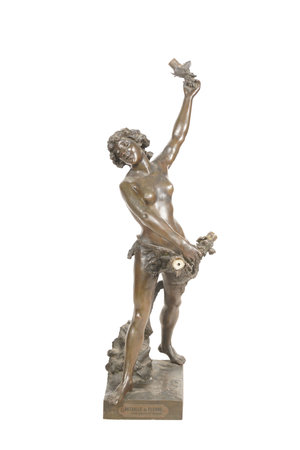 Bronze statue of a woman with a cross on a white backgroundの写真素材