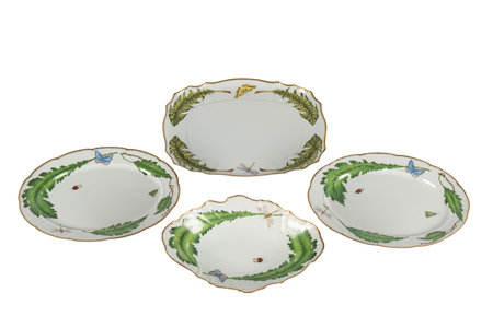 Three empty porcelain plates isolated on white background with clipping pathの写真素材