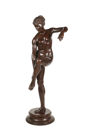 Wooden statue of a man isolated on a white background. Studio shot.の写真素材