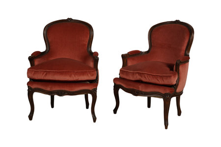 Two antique leather armchairs isolated on white background with clipping path.の写真素材