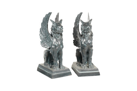 two bronze statuettes of horses isolated on a white background.の写真素材