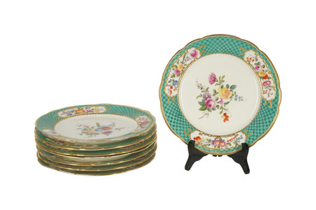 Antique porcelain plate isolated on white background with clipping pathの写真素材